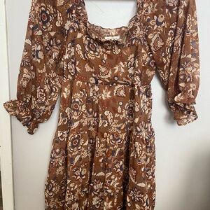 Cute floral dress brown with blue and gold.